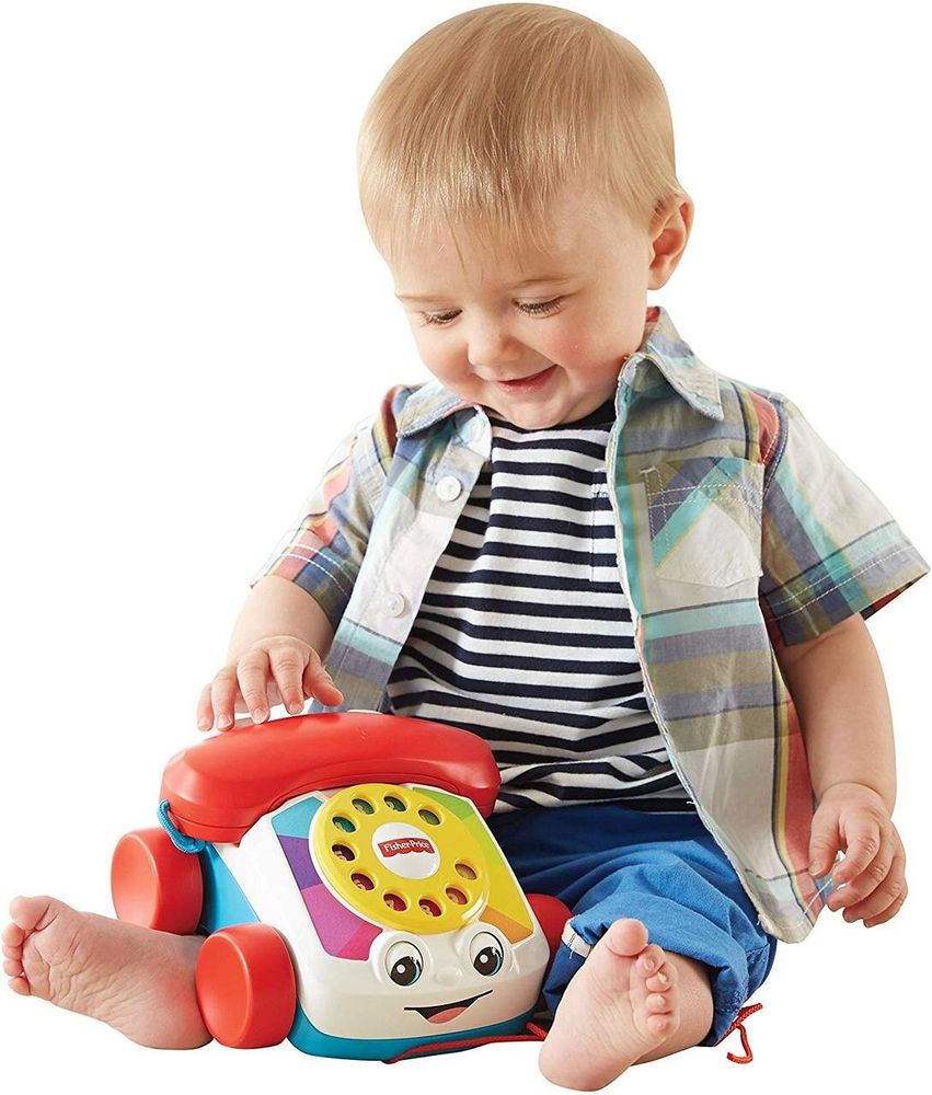 Іграшка каталка Веселий телефон на колесах від Fisher-Price Chatter Telephon